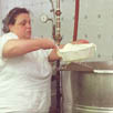 Maria Cubellis scooping curds into the kettle; Foodways; 2000: Everett, Massachusetts